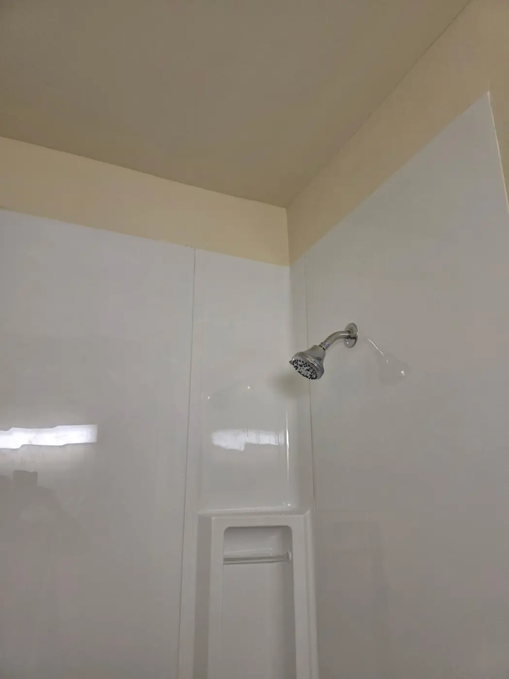 New 80 inch tub surround installed over Durock cement board and mold resistant drywall in a restored Denver bathroom